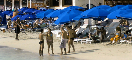 Tourists enjoy beach in St. Maarteen.  Photo by E.W. Faircloth