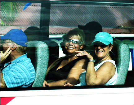 Tourists on buses leaving Marigo in St. Maarten.  Photo by E.W. Faircloth