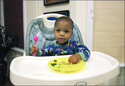 Naji eats by himself.  Photo by E.W. Faircloth